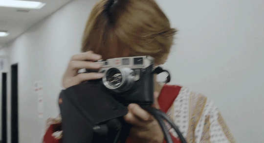 taehyung taking a picture of you in public and you...